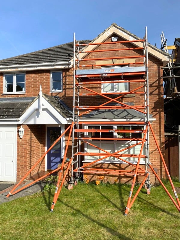 Exterior house repaint with scaffold by Paint and Maintain